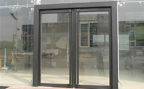 精河玻璃地弹门