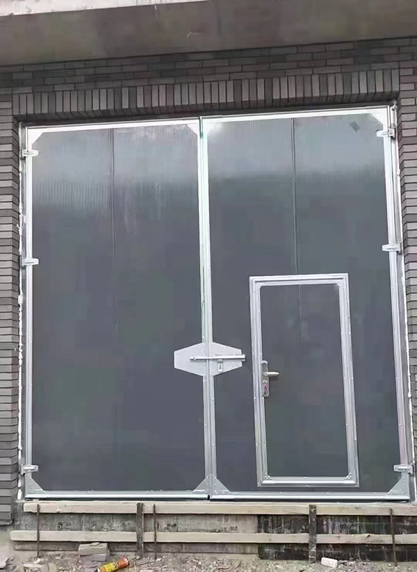 精河工业平开门在大型设备制造车间的应用实例